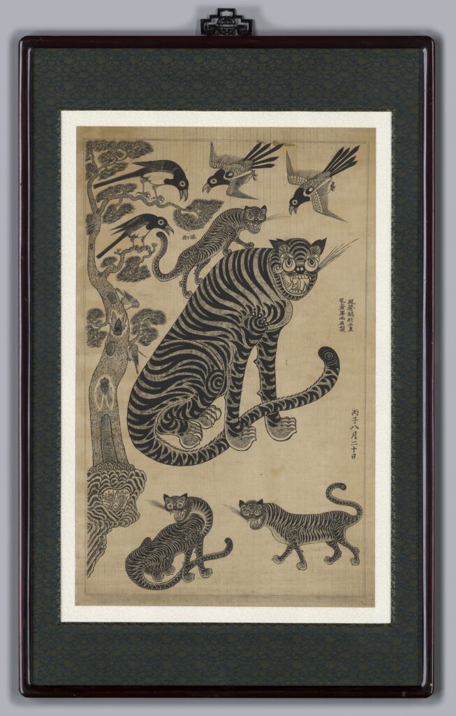 Korean Folk Painting hojakdo paintings feature tigers and magpies among pine trees. But these aren't the fearsome predators you might expect. Korean minhwa tigers are rendered with comical expressions—plump bellies, friendly faces, and occasionally goofy grins.