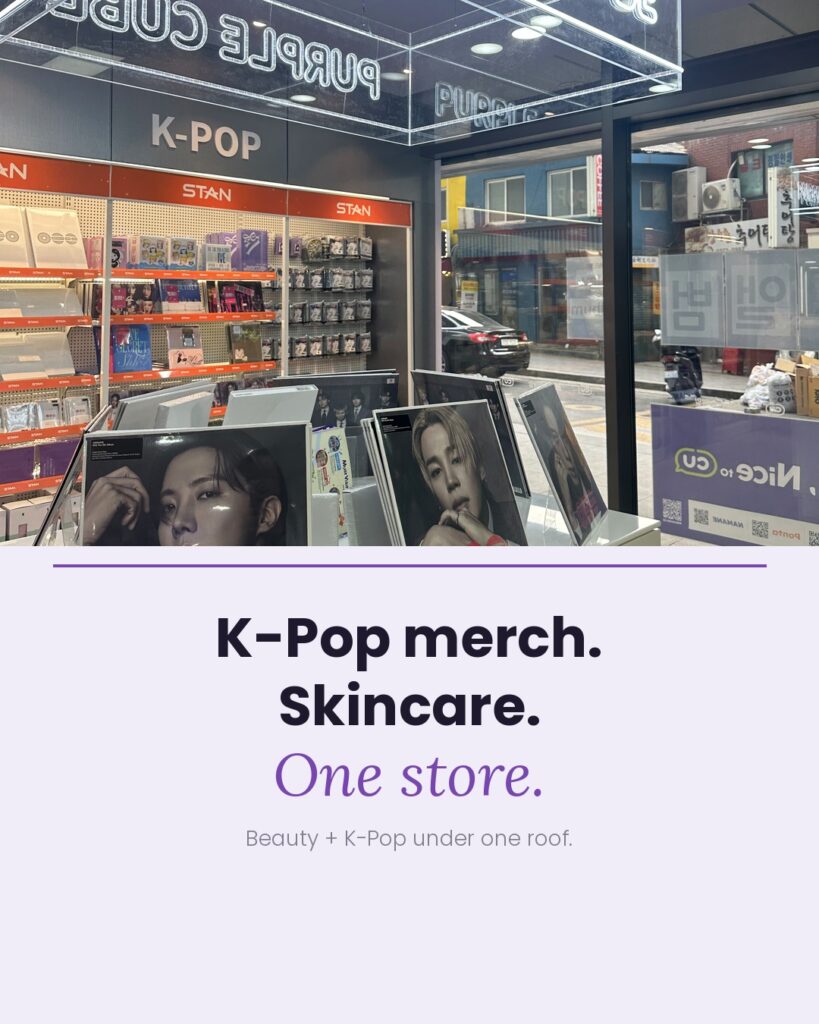 Purple Cube K-Pop merchandise zone inside CU convenience store with K-Pop albums and photo cards on display under neon signage. Text reads "K-Pop merch. Skincare. One store." Photo by @reputis.mag.