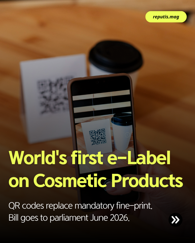 Text reading "World's first e-Label" explaining QR codes will replace mandatory fine print on cosmetics, with bill going to parliament June 2026.