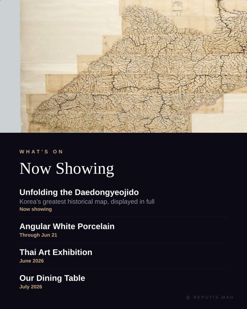 Close-up of the Daedongyeojido, a 
historic Korean map from 1861 showing intricate 
mountain ranges and river systems drawn in ink on 
aged paper. Below, exhibition list reads 
"Unfolding the Daedongyeojido now showing, Angular 
White Porcelain through Jun 21, Thai Art Exhibition 
June 2026, Our Dining Table July 2026." 
@reputis.mag