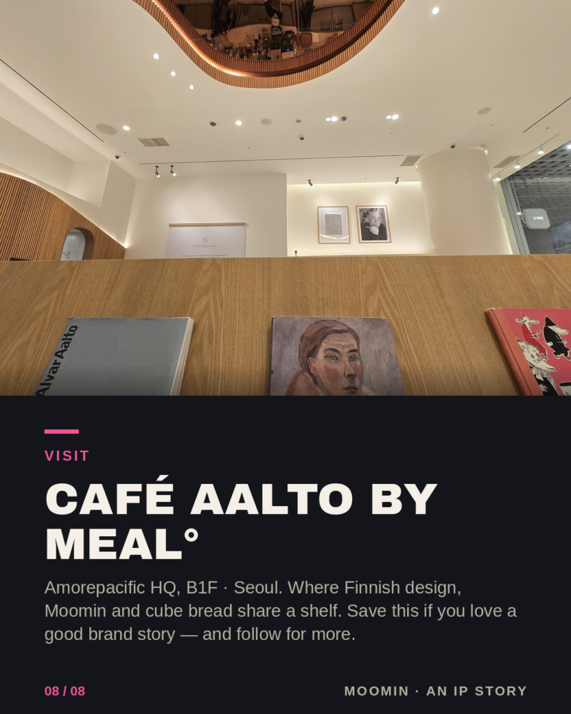 Interior of Café Aalto by Meal° with a wavy mirrored ceiling and Aalto, Jansson and Moomin books in the foreground.-Moomin Business