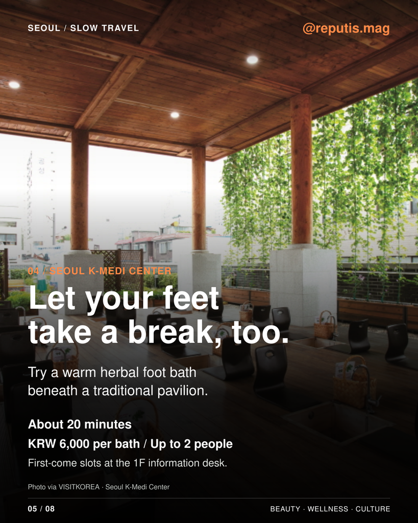 Low seats and recessed foot baths beneath the wooden pavilion at Seoul K-Medi Center.